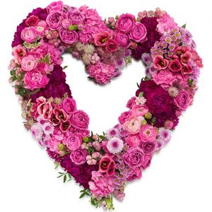 Rouwarrangement open hart vorm roze bloemen